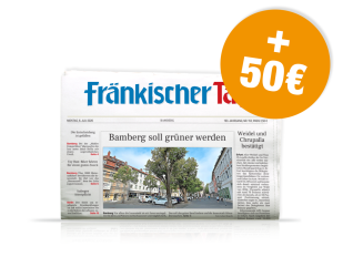 gedruckte Zeitung Fränkischer Tag mit orangem Kreis plus 50 €