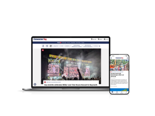 Aufgeklappter Laptop mit der Website fraenkischertag.de, daneben ein Smartphone mit Plus des Fränkischen Tag auf dem Desktop.