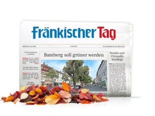 Printausgabe Fränkischer Tag mit buntem Laub davor dekoriert.